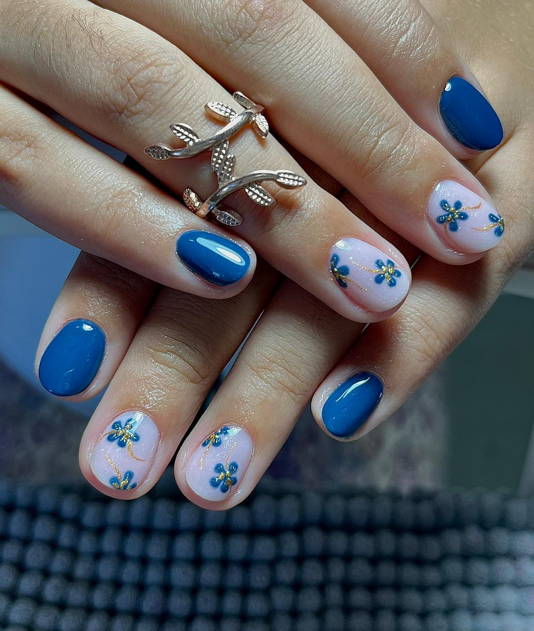 Blue floral nail design