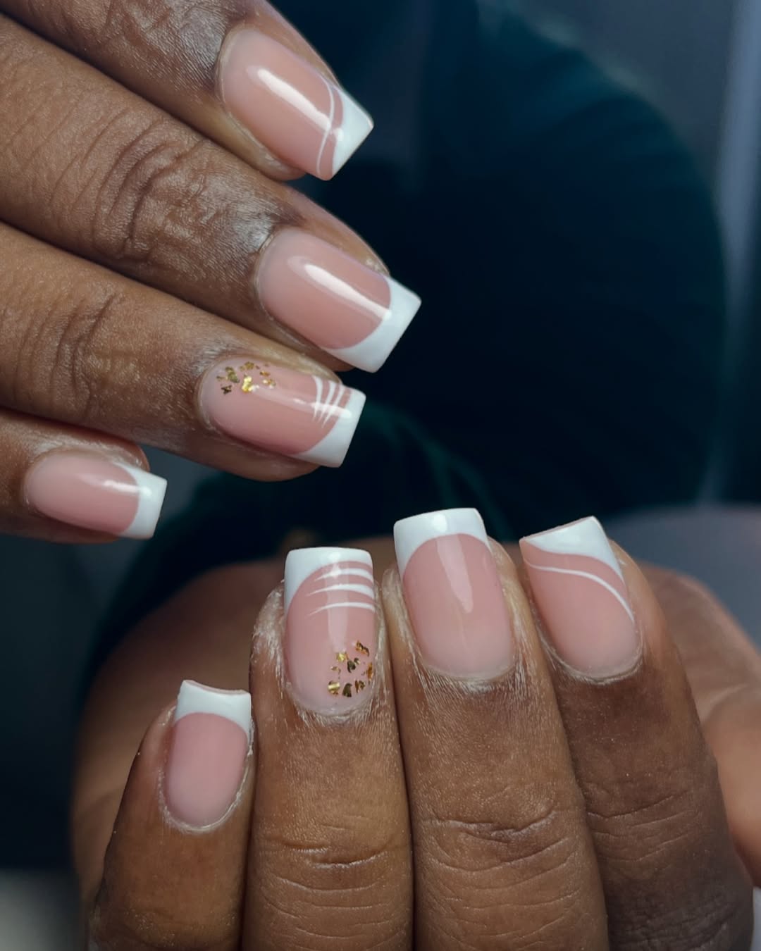 Clean and classy french tips with gold bling