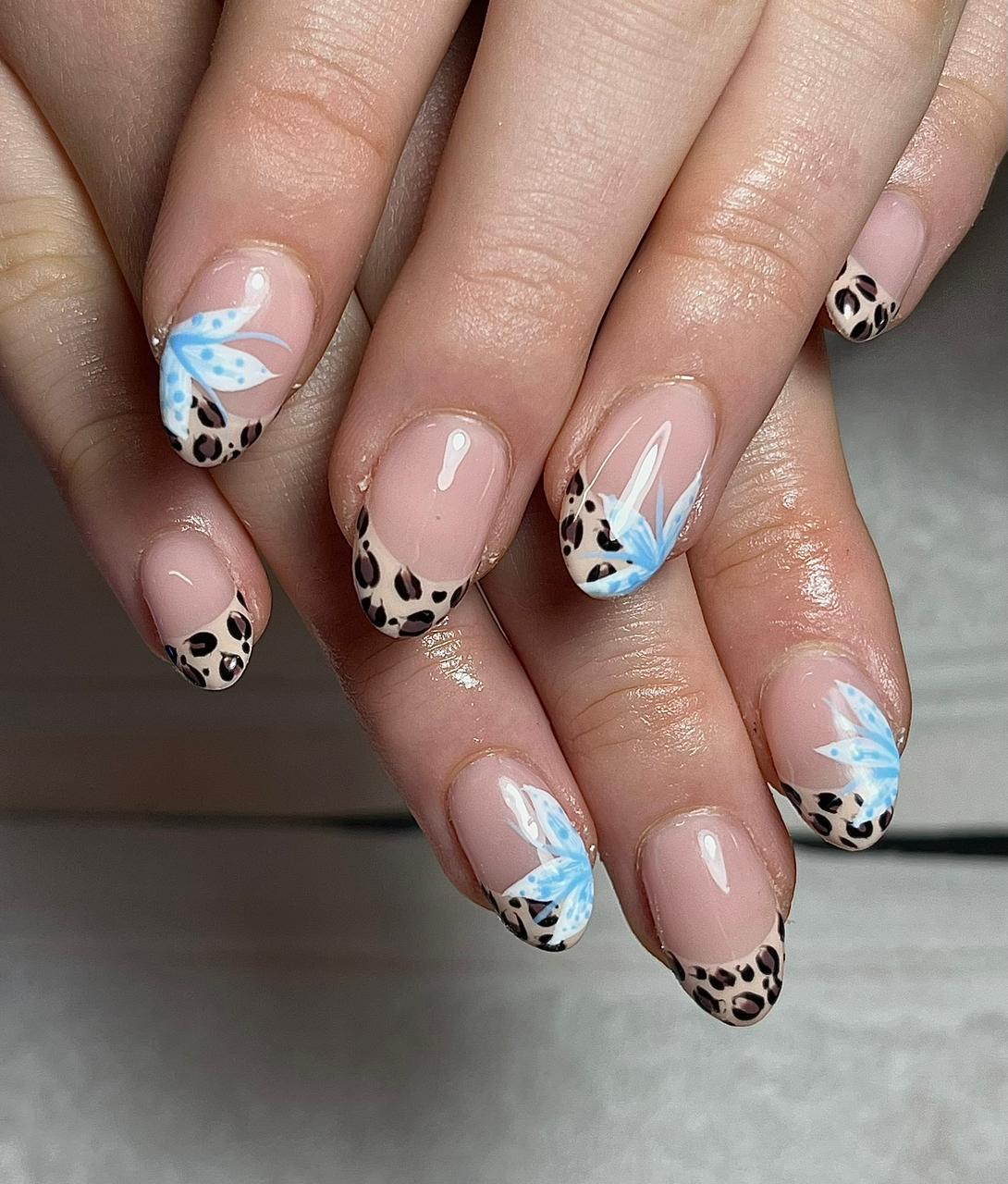 Leopard and butterfly nail art